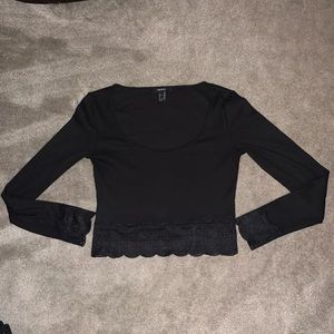 Black long sleeve crop top with lace bottom